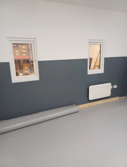 The same unit painted and the new floor laid