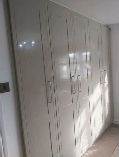 Fitted wardrobes built into a bedroom